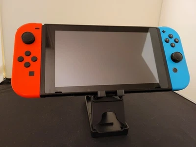Nintendo Switch V1 Red/Blue + Green/Pink Joy-Cons, 128GB SD, Zelda Case, Extras - Image 1 of 4