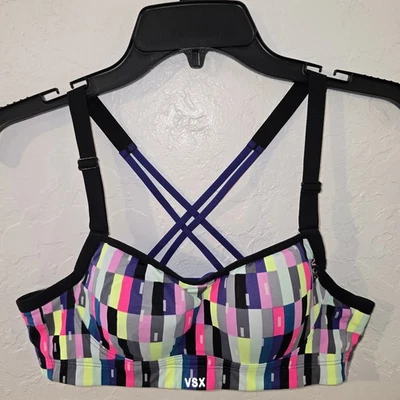 Sutiã esportivo Victoria Secret VSX brilho no escuro com tiras nas costas multicolor 36A - Imagem 1 de 4