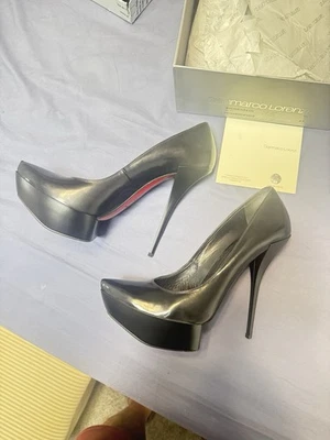 Bomba para mujer Gianmarco Lorenzi ¡Rara!  Talla 41/11 Negro Foto 1 de 4