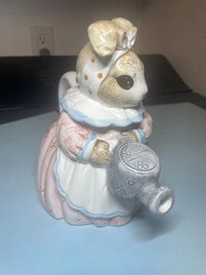 Whimsical Tea Pot Bunny Rabbit in Pink Dress Holding Watering Can - Image 1 of 4