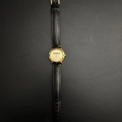 RARO RELOJ CORREA DE CUERO VINTAGE CHAPADO EN ORO 18K Konica INFINITY IMAGE LOGO Foto 1 de 3