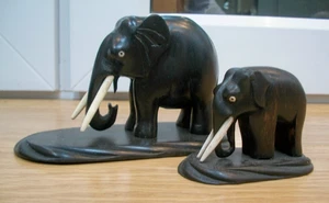 TWO  ANTIQUE  EBONY  HAND CARVED WOODEN ELEPHANTS ON CARVED BASES - Picture 1 of 4