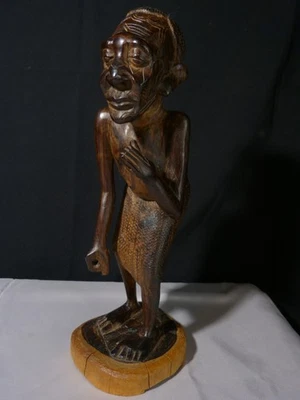 Sculpture statue africaine en bois d'ébène homme africain afrique 20 siècle - Photo 1/4