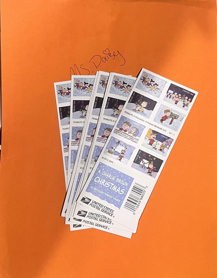 200 estampillas de Navidad Forever nuevas 10 libros estampillas de Charlie Brown Foto 1 de 3