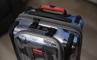 TUMI x STAPLE International Dual Access Expandable 4-Wheel Aluminum Carry On - Image 1 of 4