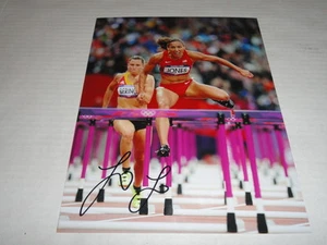 LOLO JONES SIGNED 8X10 PHOTO USA OLYMPICS TRACK AND FIELD SUPERSTAR - Picture 1 of 1
