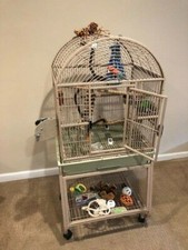 New listing
Bird cage with stand. Overall 18 x 24 x 53 dome top beige. Includes toys shown