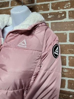 Casaco de inverno Reebok reversível jaqueta acolchoada menina’s Mauve pele sintética tamanho 10/12 - Imagem 1 de 4