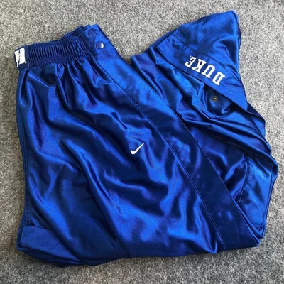 Pantalones Nike Duke Blue Devils Hombres Grandes Azul Y2K Calentamiento Snap Tear Breakaway Brillantes Foto 1 de 4