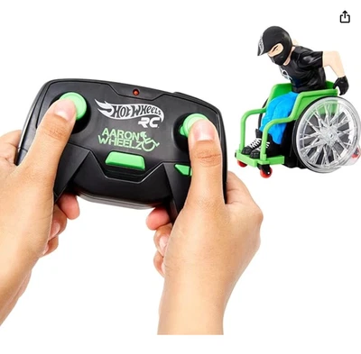 RC Aaron Wheelz Wheelie Chair Remote Control Wheelchair with Figure USED - Image 1 of 4