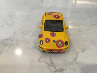 Nuevo Ray 1/32 Nuevo Beetle Speedy Power Diecast Foto 1 de 4