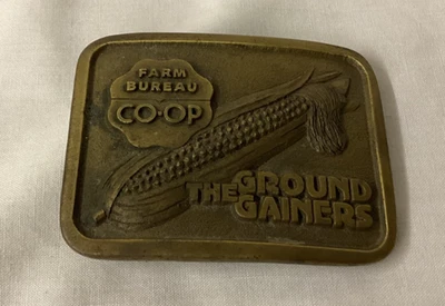 Hebilla de cinturón vintage de latón pesado FARM BUREAU COOPERATIVA The Ground Gainers Foto 1 de 3
