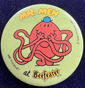 MR MEN - MR TICKLES AT BEEFEATER ADVERTISING BUTTON PIN BADGE 1986 - Picture 1 of 3