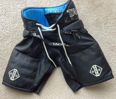 Pantalones de hockey sobre hielo Tackla Junior cintura 24 pulgadas Foto 1 de 4