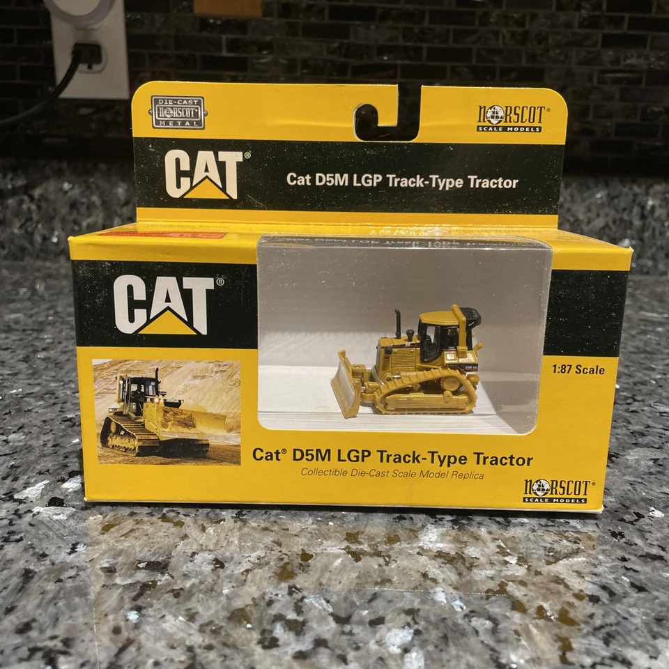 NORSCOT #55108  Caterpillar D5M LGP Track Type Bulldozer  H.O.Scale 1:87 Scale  - Image 1 of 4