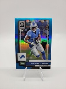 Amon-Ra St. Brown /299 Light Blue Prizm 2022 Panini Donruss Optic Lions