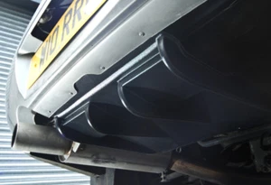 Se adapta a Subaru Impreza. Difusor divisor trasero central universal ABS 92-07. Coches de alta distribución - Imagen 1 de 3