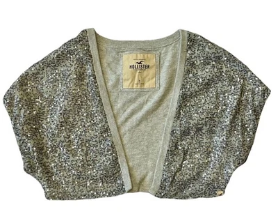 Suéter Hollister Lentejuelas Bolero Encogerse de hombros Gris Plateado Talla S Y2K Fiesta Vacaciones Glamour Foto 1 de 4