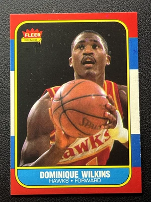 Tarjeta de novato Fleer 1986-87 - Dominique Wilkins #121 está en gran forma Foto 1 de 2