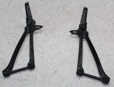 08-10 KAWASAKI NINJA ZX10R JUEGO DE CLAVIJAS DE PASAJERO TRASERO PAR Foto 1 de 4