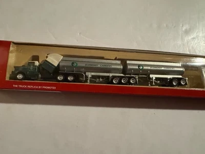 Camión Kenworth Herpa Promotex HMK, escala 1:87 con remolque cisterna doble tren B Foto 1 de 4