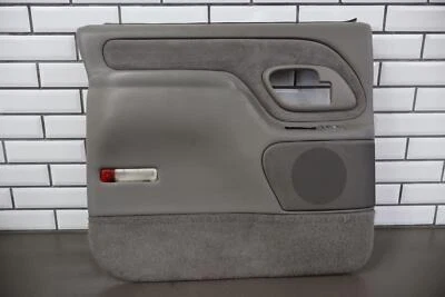 Panel puerta trasera izquierda Chevy Suburban GMT400 95-99 (gris 132) Foto 1 de 4