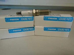 Genuine Mazda Spark plugs x 4 C402-18-110C fits Mazda 2 2003-2007 - Picture 1 of 2