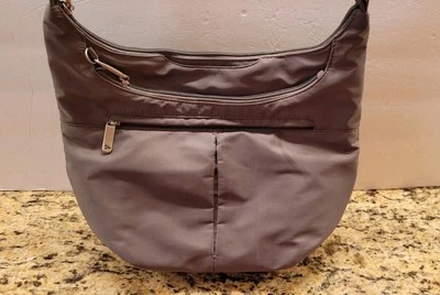 Travelon Bolso Cartera Gris Antirrobo Bandolera Correa Ajustable Bolsillos con Cremallera Viaje Foto 1 de 4