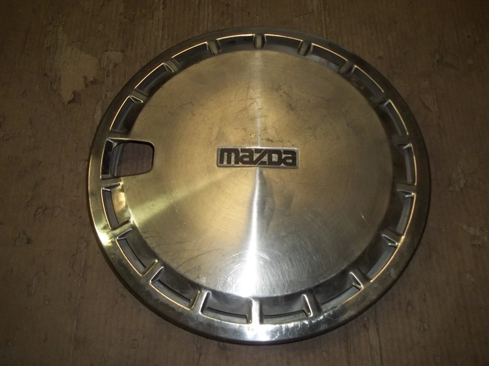 83 84 85 86 Mazda GLC 1983 tapacubos llanta tapacubos 13" fabricante de equipos originales usado 56507 Foto 1 de 4