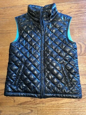 Chaleco acolchado Aeropostale P.S. Gorp Core para niños talla 8 negro con interior verde azulado niñas Foto 1 de 4