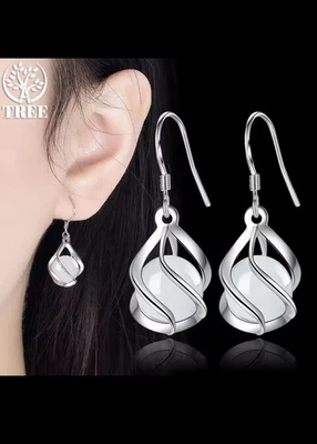 ORECCHINI PENDENTI CON PIETRA  BIANCO GHIACCIO - Immagine 1 di 4