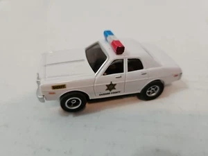 2006 Auto World Dukes of Hazzard SHERIFF POLICE CAR ROSCOE SLOT CAR UNTESTED - Picture 1 of 8