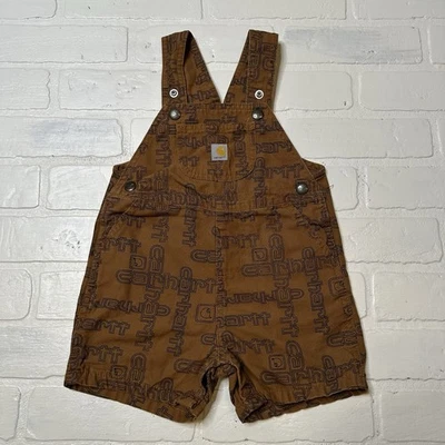 Carhartt Baby ребенка ясельного возраста младенца коричневый логотип короткий комбинезон шорты холст 24 M AOP - Изображение 1 из 4