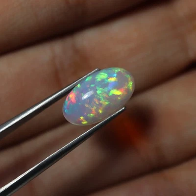 2,4 quilates 13,6 x 7,6 mm real AAA llamativo multi fuego blanco ópalo etíope cabujón ovalado Foto 1 de 4