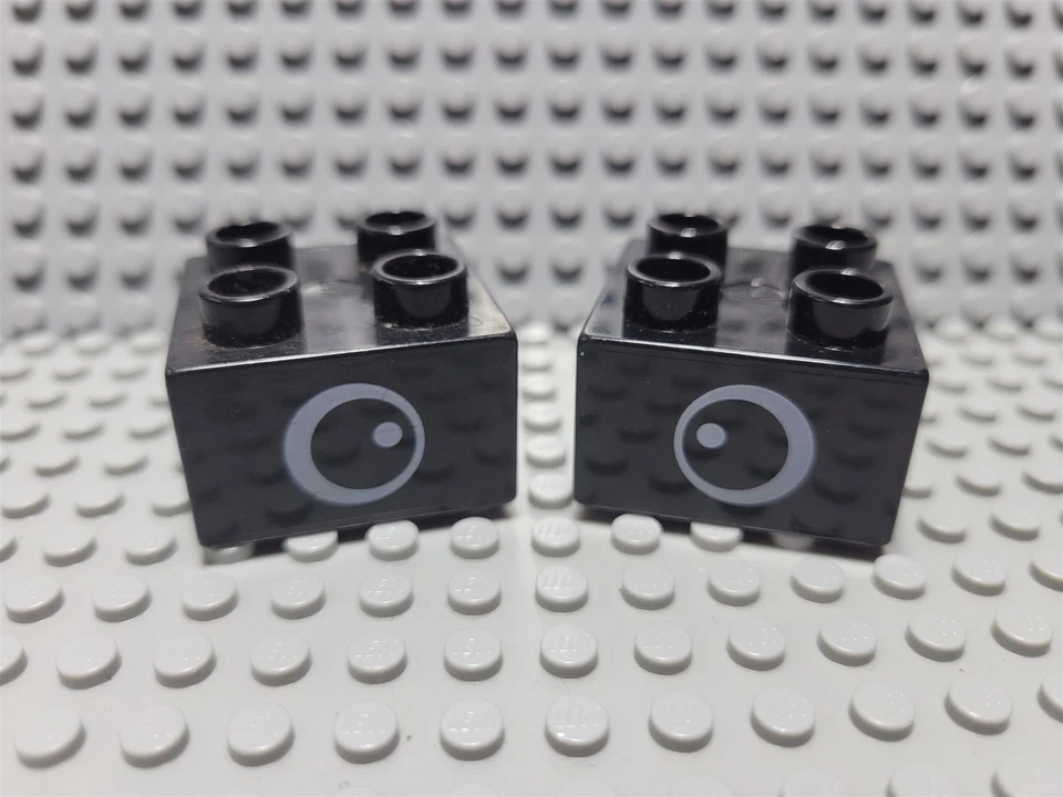 LEGO Duplo Lot of 2 Black 2x2 Eye Decorated Building Bricks - Image 1 of 1
