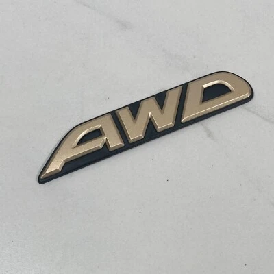 2000-2004 Subaru Outback AWD Emblem Badge Letters Rear Tailgate Black Gold - Image 1 of 4