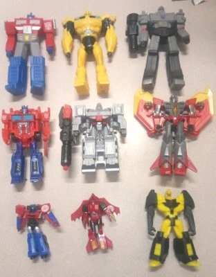 Lote de 9 Transformers Titan, Megatron, Optimus, Decepticons, Autobots, Bumblebee - Imagem 1 de 4