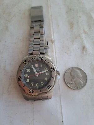 Swiss Military Watch. 095 0489. WR 100M. RUNS WELL.   - Image 1 of 4