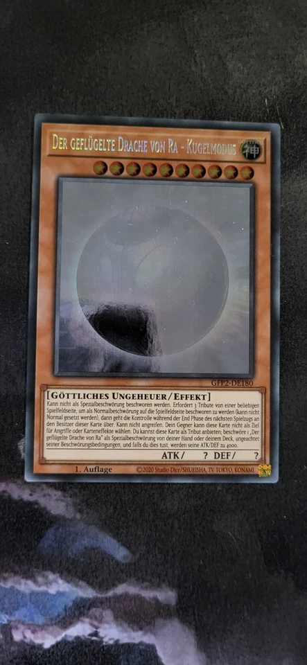 Yu-Gi-Oh! Der geflügelte Drache von Ra-Kugelmodus Ghost Rare Near Mint! German! - Bild 1 von 2