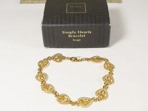 Precioso Brazalete Avon Simply Corazones Grande Tono Dorado C4910 - Imagen 1 de 5