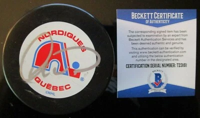 PUCK DE HOCKEY FIRMADO POR DALE HUNTER QUEBEC NORDIQUES BECKETT BAS CERTIFICADO DE AUTENTICIDAD T23161 Foto 1 de 2