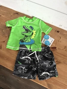 Boys 6m Dinosaur Swim Suit 2pc Navy Blue Trunks Shorts Green T-Shirt Carters NWT - Picture 1 of 8
