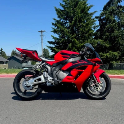 Carenado de plástico de inyección rojo brillante negro apto para Honda 2004 2005 CBR 1000RR Foto 1 de 4