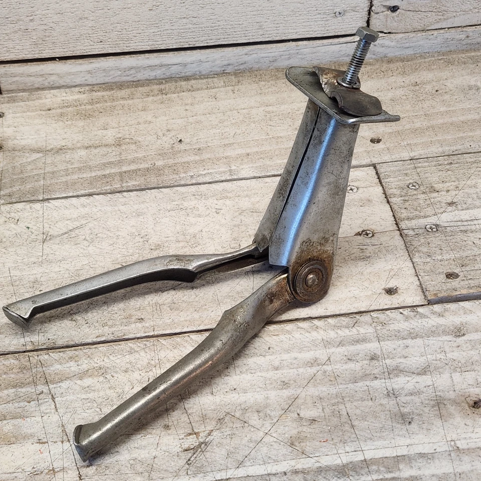 Pata de cabra Rollfast de la década de 1960 soporte para bicicleta utilería bicicleta tanque doble Foto 1 de 4