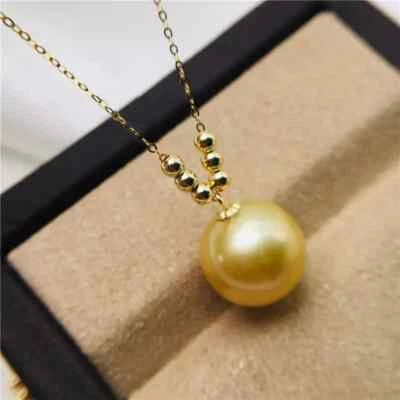 ENORME COLGANTE AAAA 12-11 MM MAR SUR REDONDO PERLAS DORADAS ORO 18K/AU750 Foto 1 de 3