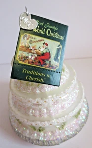 MERCK FAMILY'S OLD WORLD NAVIDAD BODA PASTEL ADORNO NUEVO CON ETIQUETA 2001 - Imagen 1 de 5