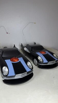 ОРИГИНАЛЬНЫЙ НЕВЕРОЯТНЫЙ ПУЛЬТ ДИСТАНЦИОННОГО РАДИО УПРАВЛЕНИЯ АВТОМОБИЛЯ DISNEY STORE набор из 2 - Изображение 1 из 4