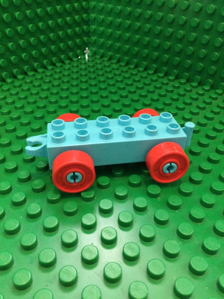 Lot 123: Lego Duplo Parts Block Brick Cyan Blue Train Cart 2x6 Base Red Wheels - Image 1 of 1