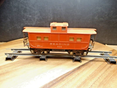 American Flyer S Gauge 35' Reading 630 Illuminated Red Center Cupula Caboose - Image 1 of 4