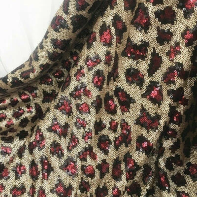 Tela de lentejuelas estampado de leopardo tela brillo costura para disfraz vestido de noche graduación Foto 1 de 4